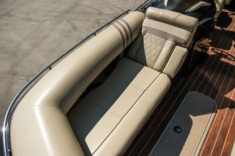 Slide: The Image of Luxurious seating on 2018 Crest Savannah 250 SLS boat with elegant upholstery. - 8