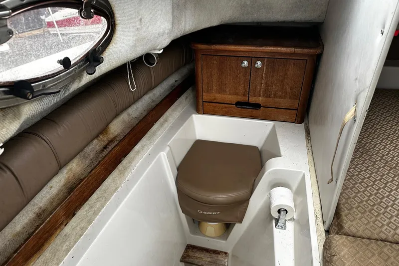 Slide: The Image of Interior of 2006 Glacier Bay 2670 boat with life jackets and storage. - 15