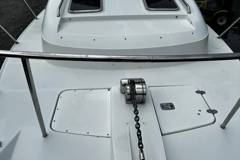 Slide: The Image of 2006 Glacier Bay 2670 boat deck with anchor chain and railing. - 5