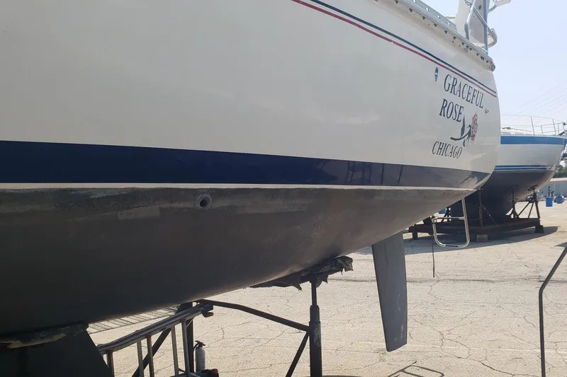 Slide: The Image of 1994 Hunter 30 sailboat "Graceful Rose" on dry dock in Chicago. - 2