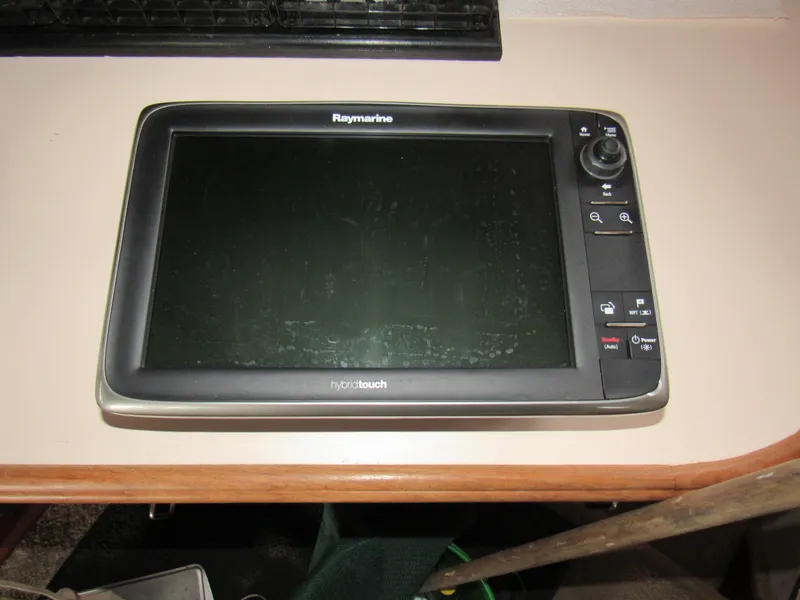 Slide: The Image of Raymarine HybridTouch marine display on a Tollycraft Sport Sedan, 1989 model. - 12