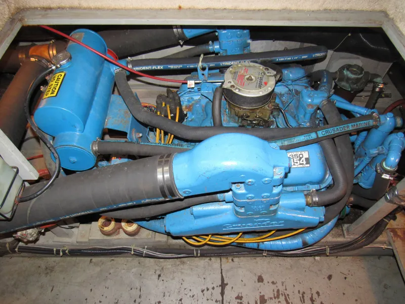 Slide: The Image of Engine compartment of a 1989 Tollycraft Sport Sedan with Crusader Marine engine. - 16
