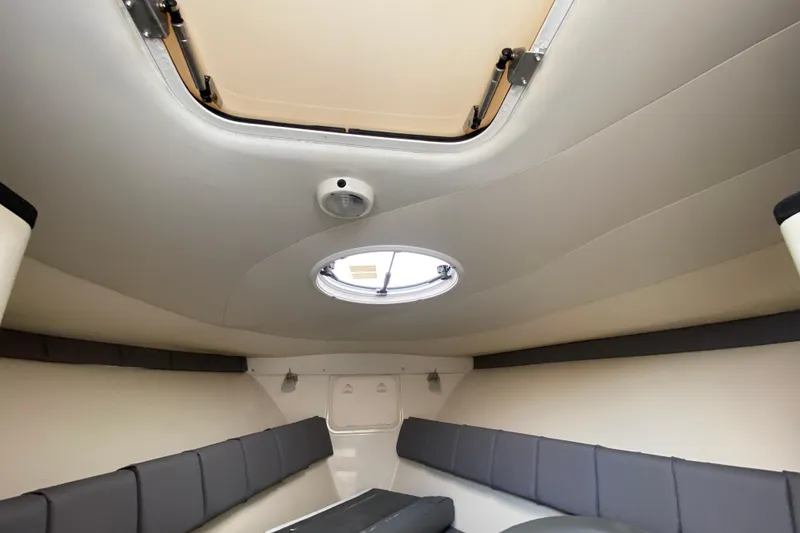 Slide: The Image of Interior cabin of 2007 Scarab 35 Sport boat with seating and hatch. - 29