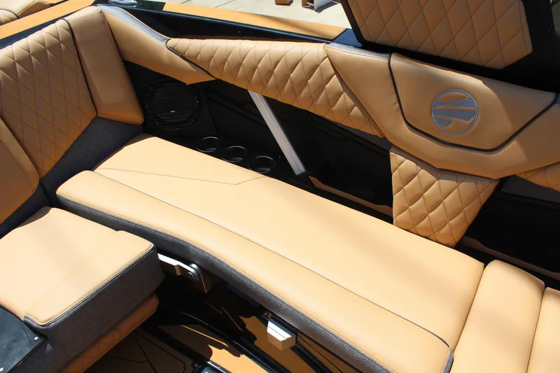 Slide: The Image of Luxurious interior of 2026 Tigé Z3 boat with tan quilted leather seating. - 12