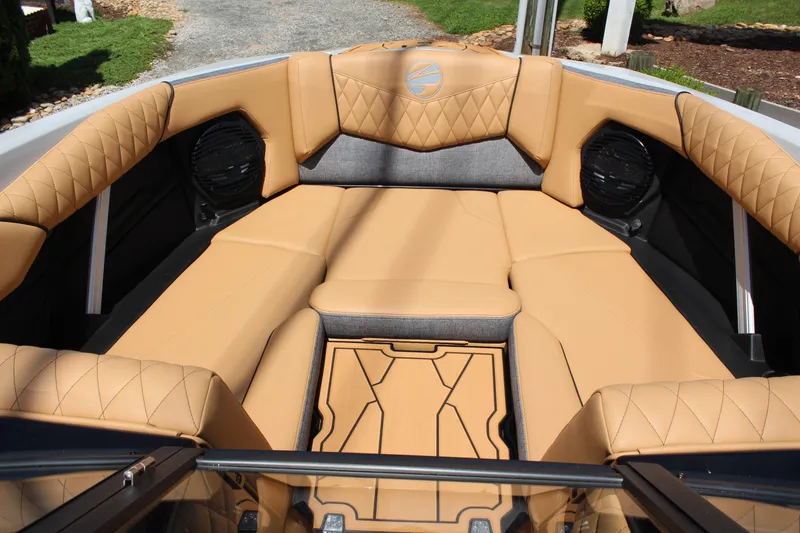 Slide: The Image of Luxurious interior of 2026 Tigé Z3 boat with tan quilted seating. - 15