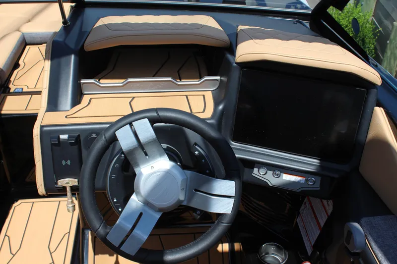 Slide: The Image of 2026 Tigé Z3 boat dashboard with modern steering wheel and touchscreen display. - 17