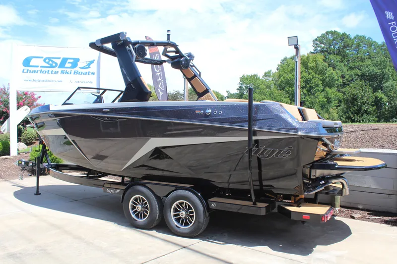 Slide: The Image of 2026 Tigé Z3 boat on trailer at Charlotte Ski Boats dealership. - 4