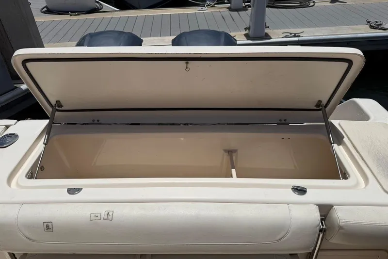 Slide: The Image of Open storage compartment on a 2020 Grady-White Canyon 306 boat. - 17