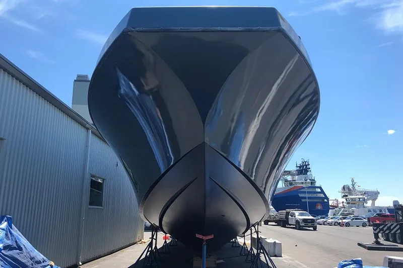 Slide: The Image of River Hawk 73 Sea Stryker Fast Patrol Boat, 2012, docked at shipyard under clear sky. - 12