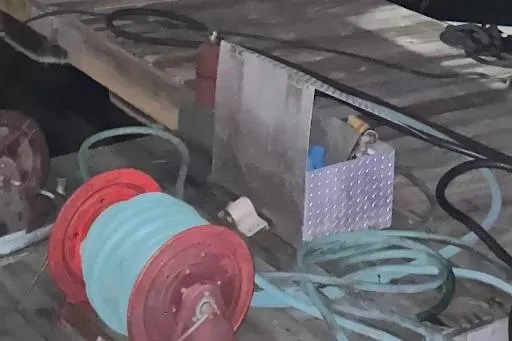 Slide: The Image of Coiled hoses and equipment on Riverhawk 73 Sea Stryker Fast Patrol Boat, 2012 model. - 22