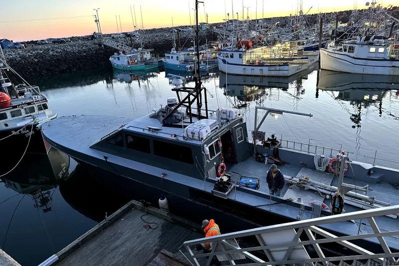 Slide: The Image of Riverhawk 73 Sea Stryker Fast Patrol Boat docked at a marina, 2012 model. - 4