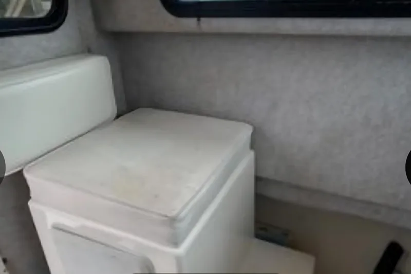 Slide: The Image of Interior of 2001 Parker 2520 Modified Vee Sport Cabin with cushioned seating. - 11