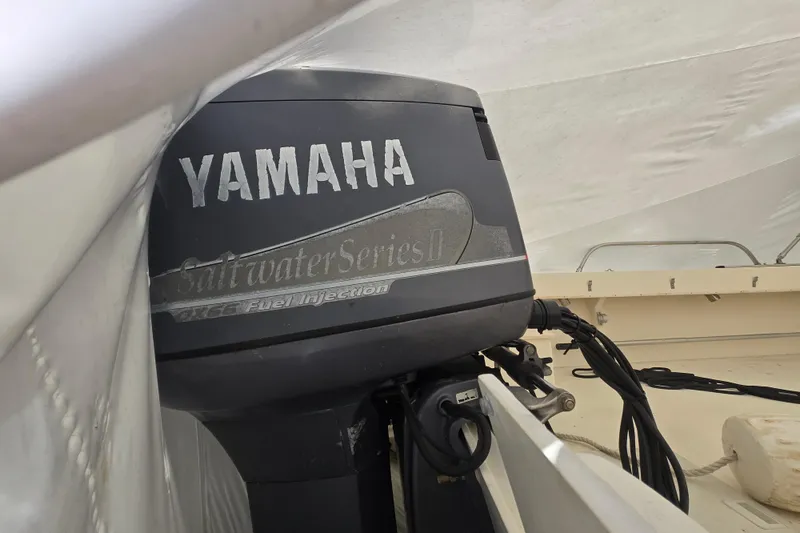 Slide: The Image of Yamaha outboard motor on 2001 Parker 2520 Modified Vee Sport Cabin boat. - 16