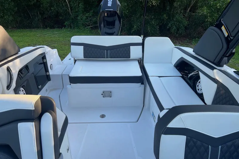 Slide: The Image of 2025 Monterey 255 Super Sport boat interior with sleek seating and modern design. - 11