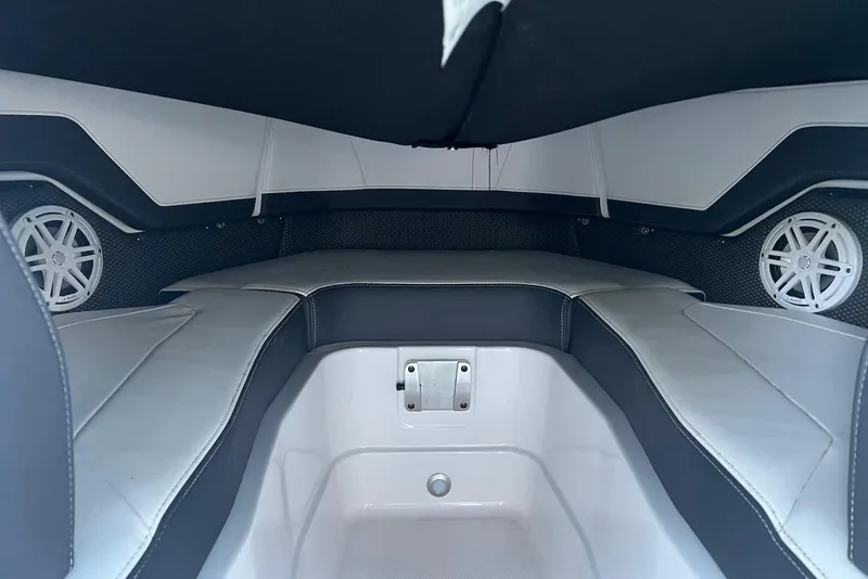 Slide: The Image of 2025 Monterey 255 Super Sport interior with sleek seating and built-in speakers. - 23