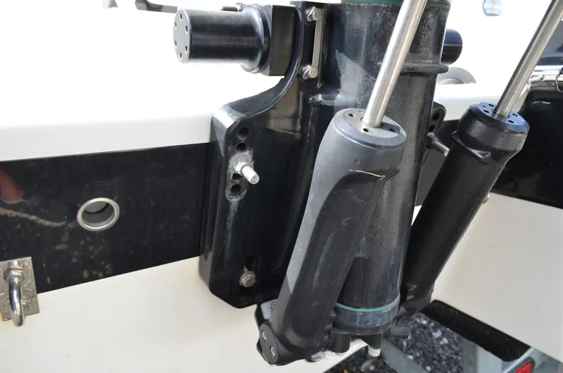 Slide: The Image of Close-up of 2018 Chaparral 250 Suncoast boat engine components and hydraulic system. - 14