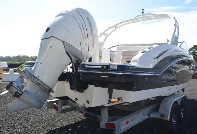 Slide: The Image of 2018 Chaparral 250 Suncoast boat with Mercury outboard engine on trailer. - 7