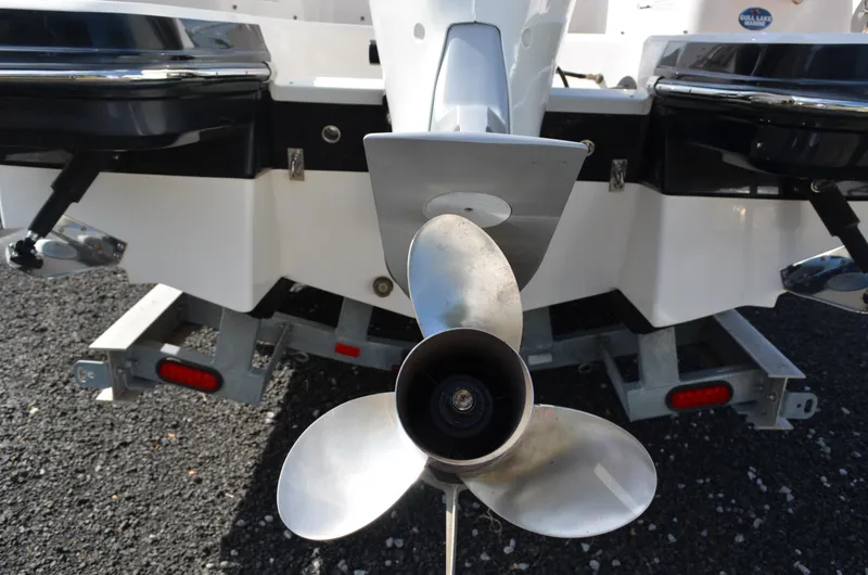 Slide: The Image of Propeller of 2018 Chaparral 250 Suncoast boat on trailer, rear view. - 9