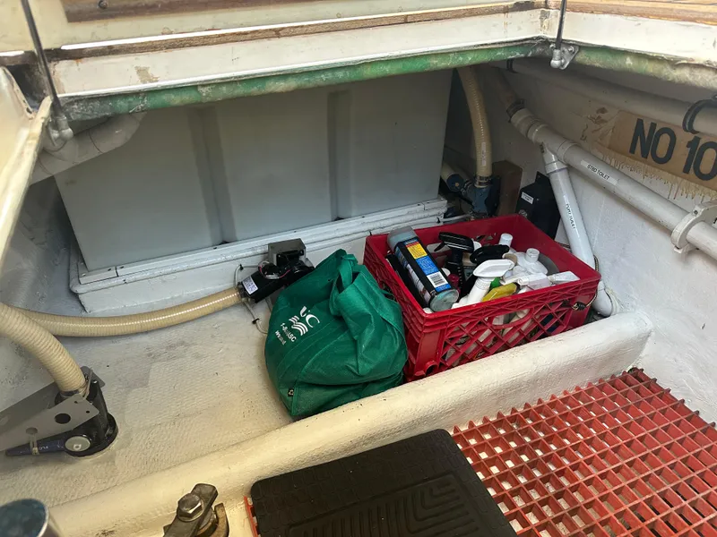 Slide: The Image of Cherubini Independence 45 yacht, 2001 model, featuring a striped cushioned seat and nautical ropes. - 58