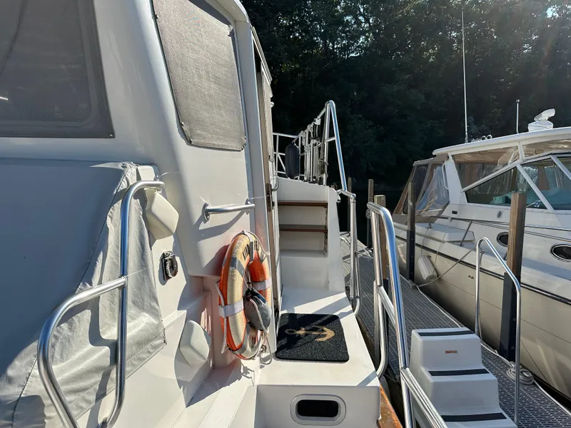 Slide: The Image of Luxurious interior of 2001 Cherubini Independence 45 yacht with cozy seating and modern kitchen. - 6