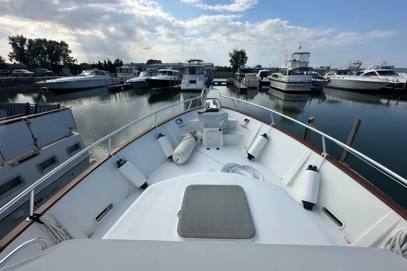 Slide: The Image of Bow view of 2001 Cherubini Independence 45 yacht docked in a marina. - 96