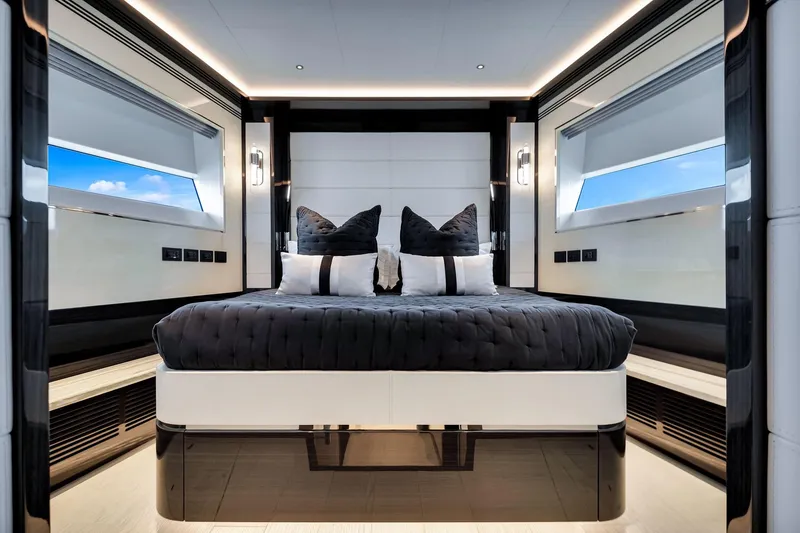 Slide: The Image of Luxurious bedroom interior of 2021 Sirena 88 yacht with modern design and large windows. - 106