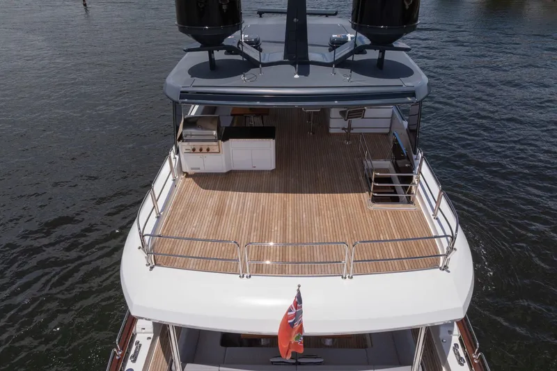 Slide: The Image of Aerial view of 2021 Sirena 88 yacht's spacious deck with outdoor kitchen. - 11