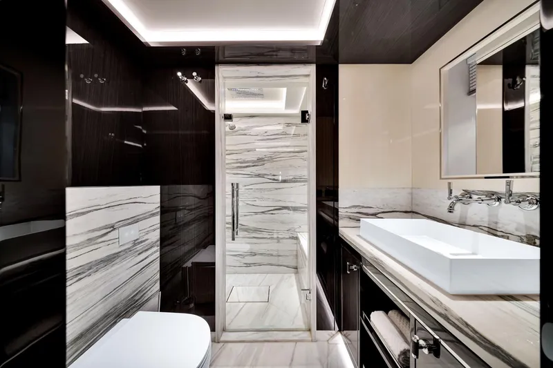 Slide: The Image of Luxurious bathroom in 2021 Sirena 88 yacht, featuring sleek marble and modern fixtures. - 114