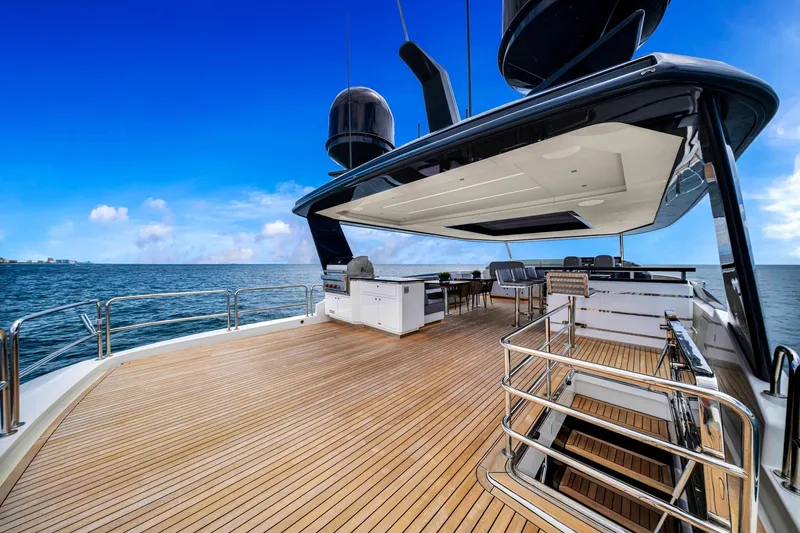 Slide: The Image of Luxurious 2021 Sirena 88 yacht deck with ocean view and modern amenities. - 12