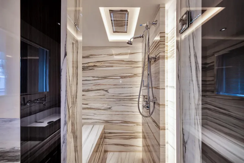 Slide: The Image of Luxurious marble bathroom interior on Sirena 88 yacht, 2021 model, featuring modern shower design. - 123