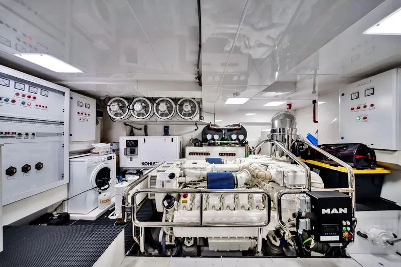 Slide: The Image of Engine room of 2021 Sirena 88 yacht with MAN engine and control panels. - 142