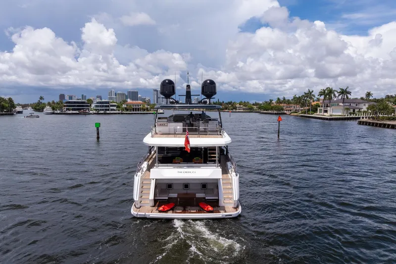 Slide: The Image of Luxury Sirena 88 yacht cruising in a scenic waterway, 2021 model. - 42