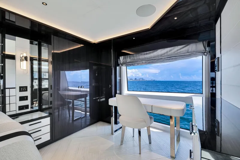 Slide: The Image of Luxurious interior of 2021 Sirena 88 yacht with ocean view through large window. - 73