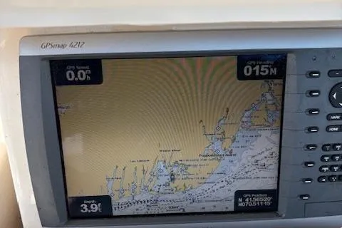 Slide: The Image of GPS navigation screen on a 2011 Grady-White Canyon 306 boat. - 10