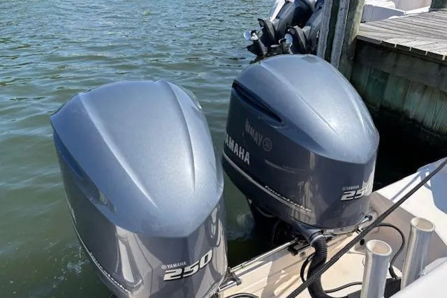 Slide: The Image of Twin Yamaha 250 outboard engines on a 2011 Grady-White Canyon 306 boat. - 3
