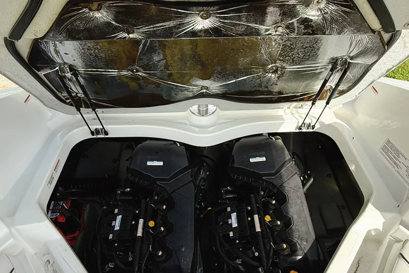 Slide: The Image of Engine compartment of a 2010 Seadoo 210 Challenger SE boat with dual engines. - 12
