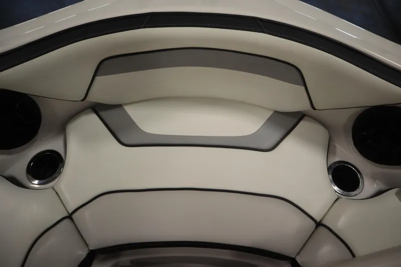 Slide: The Image of 2018 Yamaha AR195 boat interior with sleek, modern seating and cup holders. - 12