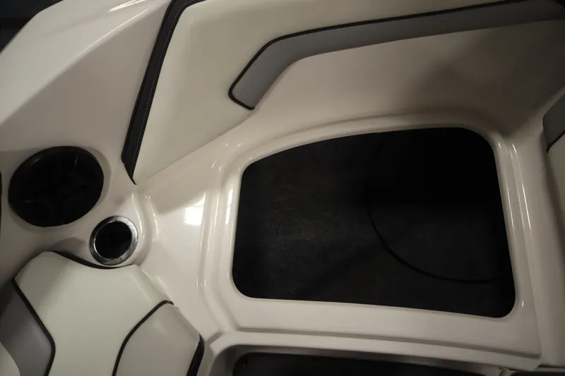 Slide: The Image of Interior view of a 2018 Yamaha AR195 boat, featuring seating and speaker details. - 17