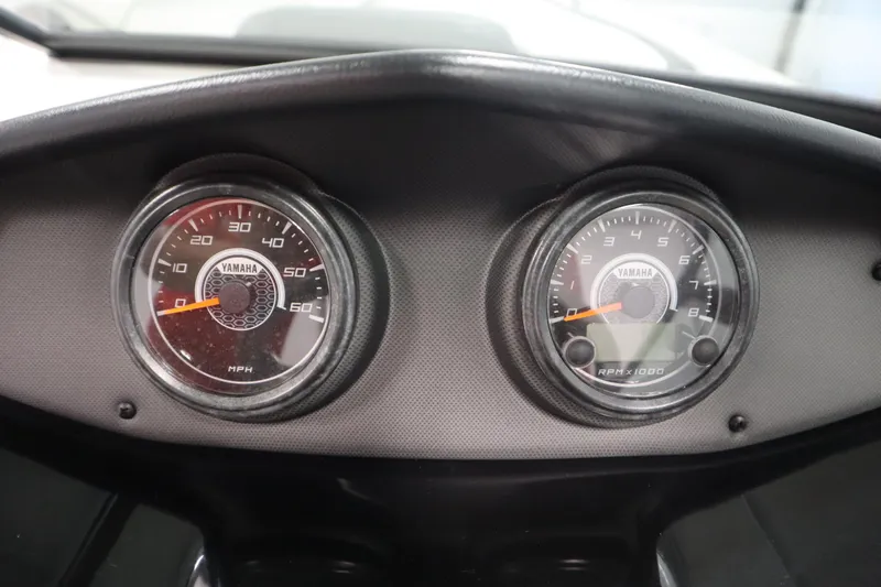 Slide: The Image of Dashboard of 2018 Yamaha AR195 boat showing speedometer and tachometer gauges. - 21