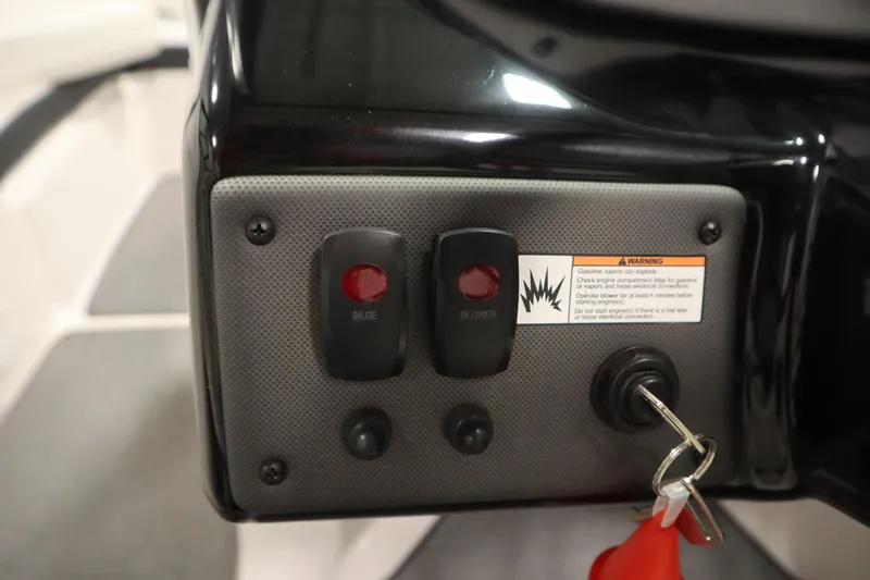 Slide: The Image of Control panel of a 2018 Yamaha AR195 boat with bilge and blower switches. - 22