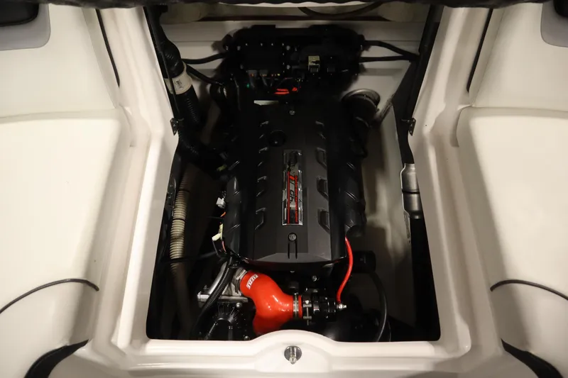 Slide: The Image of 2018 Yamaha AR195 boat engine compartment, showcasing a clean and organized layout. - 39