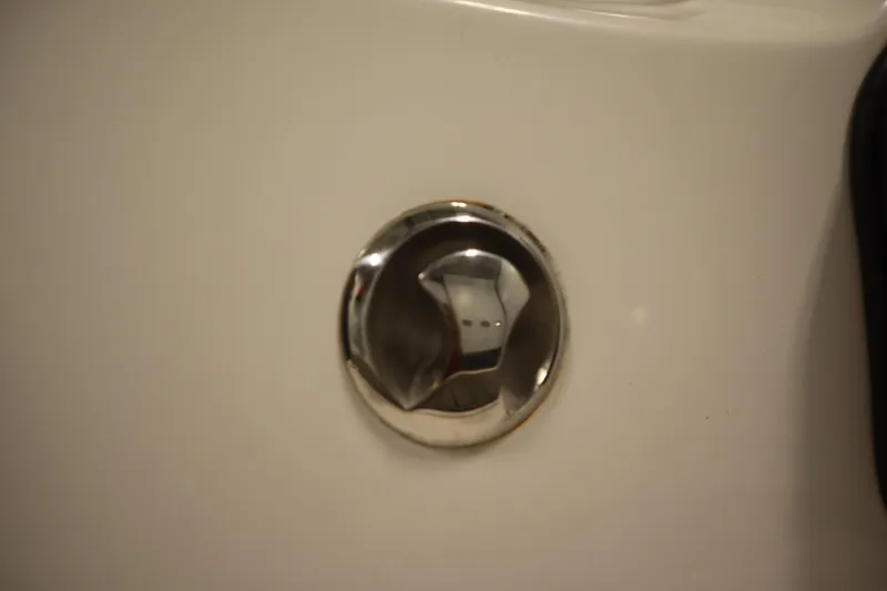Slide: The Image of Chrome drain plug on a 2018 Yamaha Boats AR195. - 46