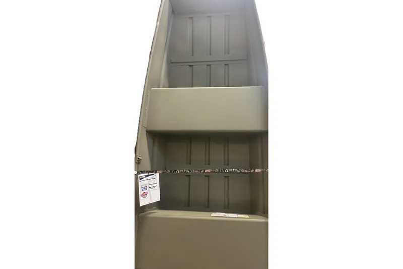 Slide: The Image of 2026 Tracker Grizzly 12 Jon boat, interior view, showcasing seating and storage. - 10