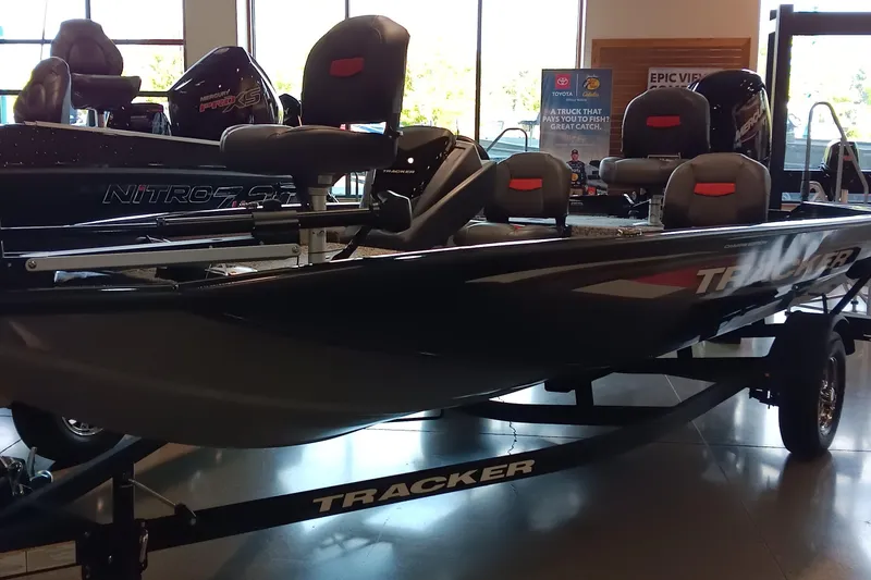 The Image of 2026 Tracker Pro Team 175 Crappie Edition boat displayed indoors. - 0