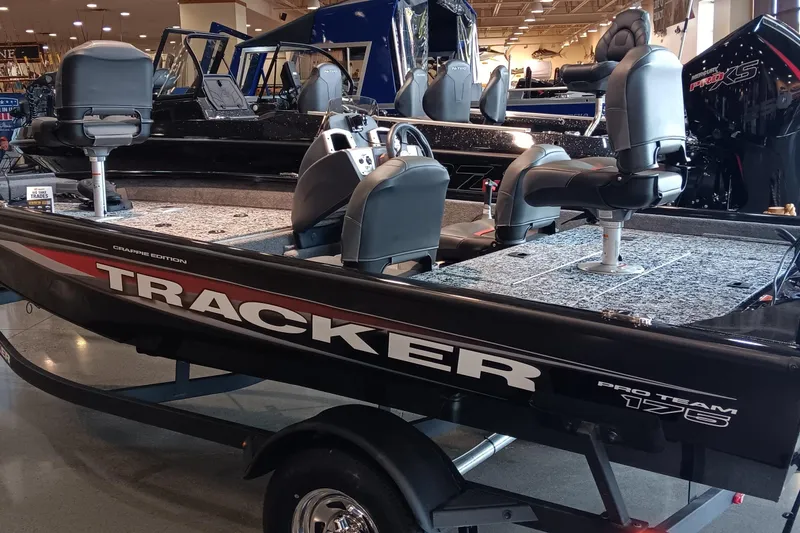 Slide: The Image of 2026 Tracker Pro Team 175 Crappie Edition boat on display in showroom. - 3