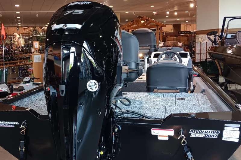 Slide: The Image of 2026 Tracker Pro Team 175 Crappie Edition boat with Mercury 75 engine in showroom. - 5