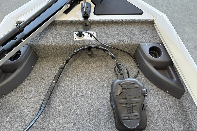 Slide: The Image of 2025 Tracker Pro Team 175 Crappie Edition boat deck with trolling motor pedal. - 18
