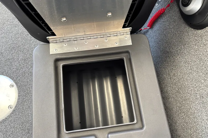Slide: The Image of Open storage compartment on 2025 Tracker Pro Team 175 Crappie Edition boat. - 24