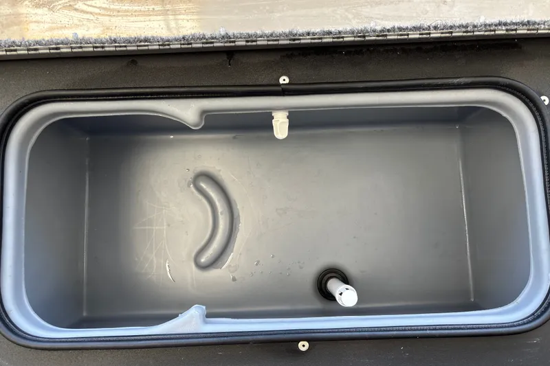 Slide: The Image of Livewell compartment in 2025 Tracker Pro Team 175 Crappie Edition boat. - 33