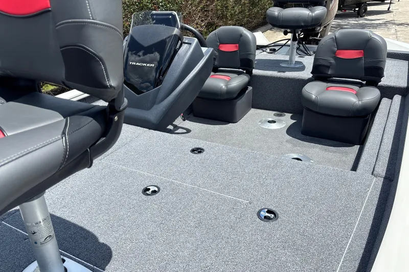 Slide: The Image of 2025 Tracker Pro Team 175 Crappie Edition boat interior with seating and console. - 17